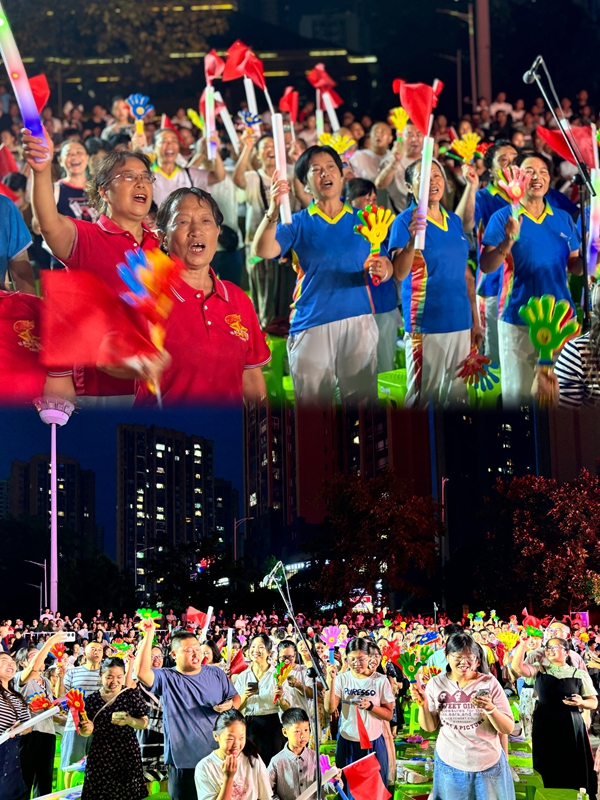 廣場上不同年齡層的市民手持小紅旗、巴巴掌等，在旋律中齊聲高歌，氣氛熱烈。張川 攝.jpg